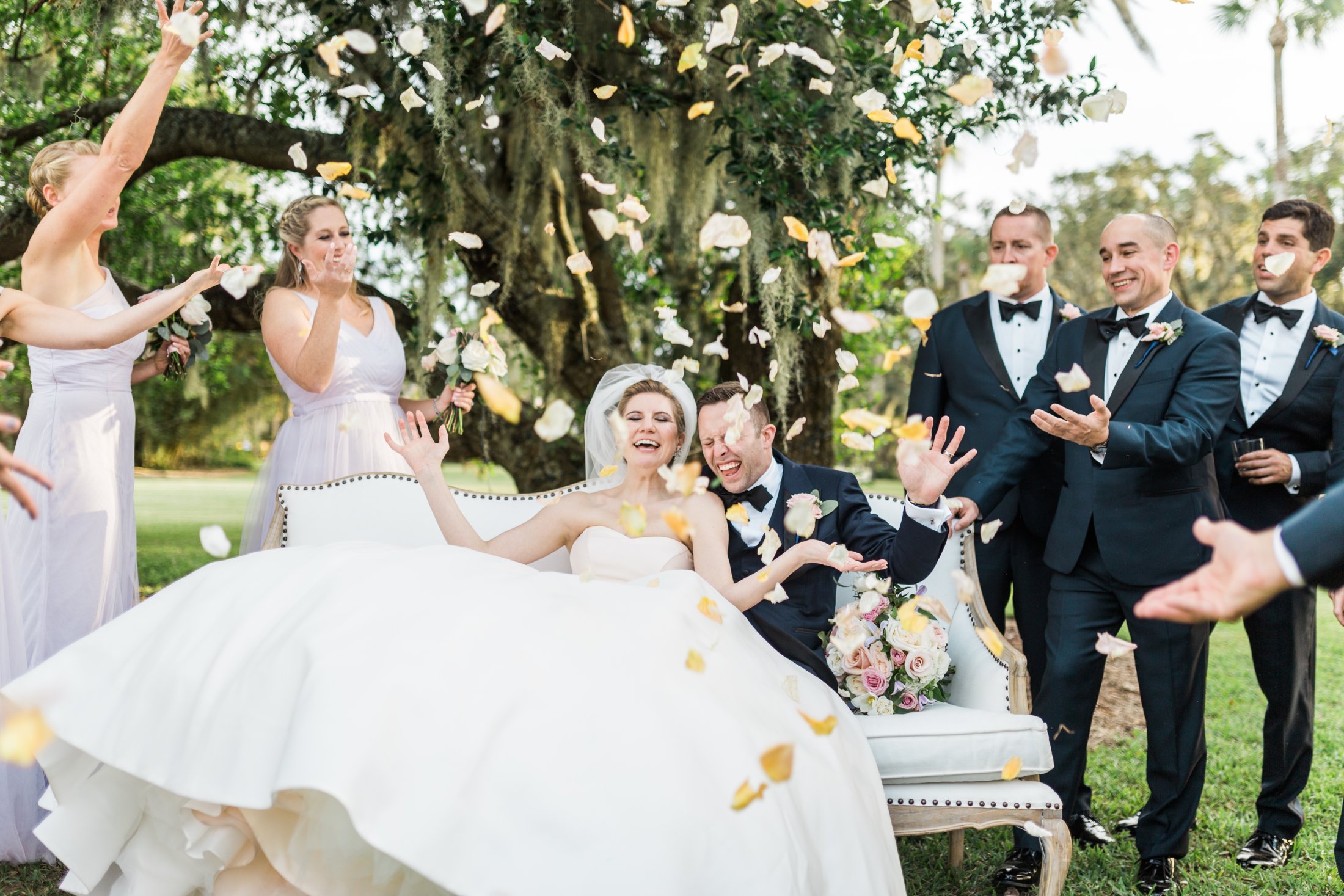 wedding_party_throwing_flower_petals.jpg Bud Johnson Photography